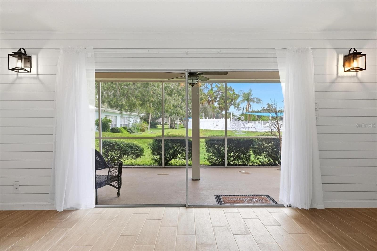Patio doors off the main living space onto lanai - 4 ANTIGUA CIR #6, ENGLEWOOD