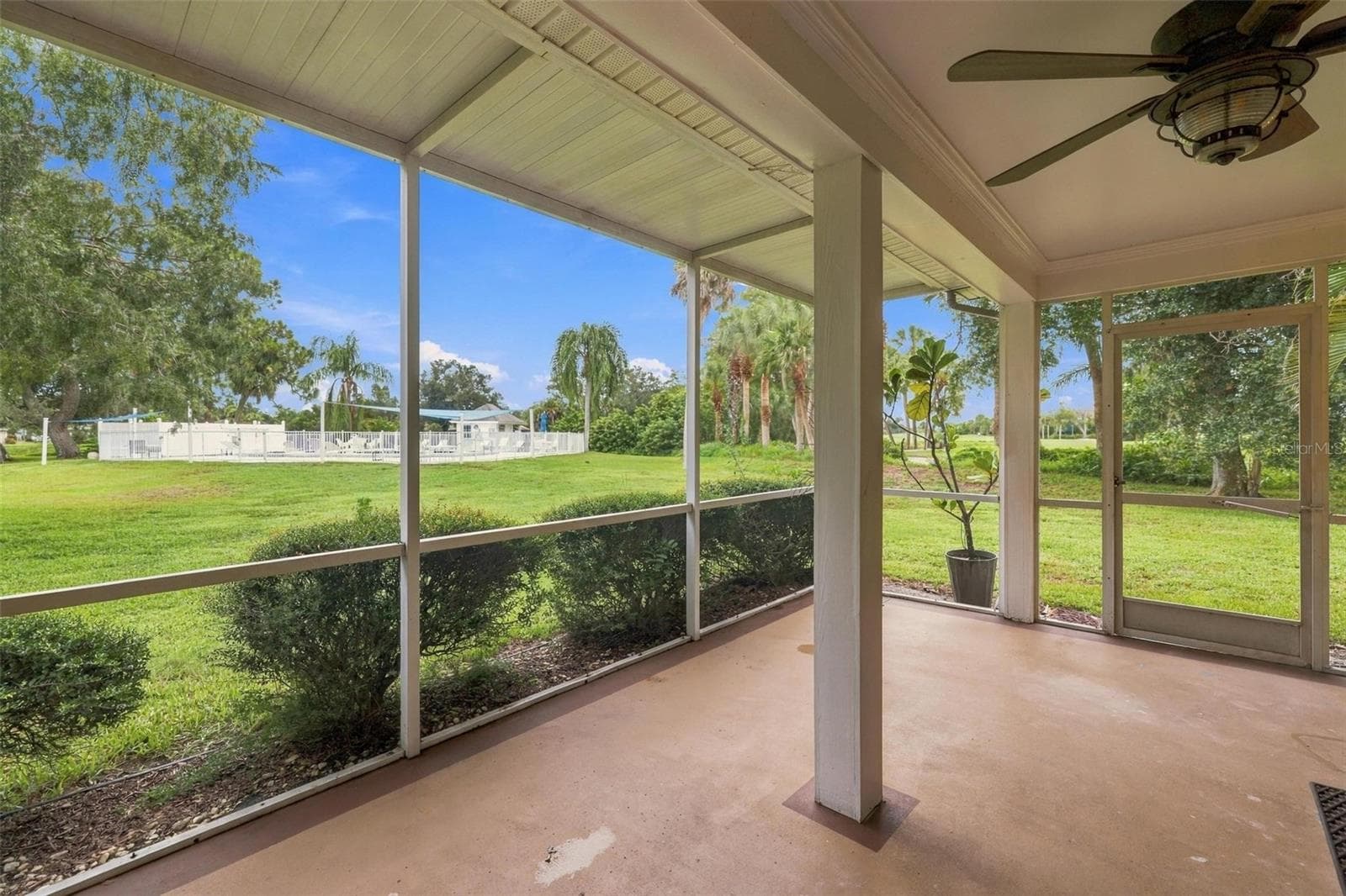 Lanai overlooking yard and pool - 4 ANTIGUA CIR #6, ENGLEWOOD