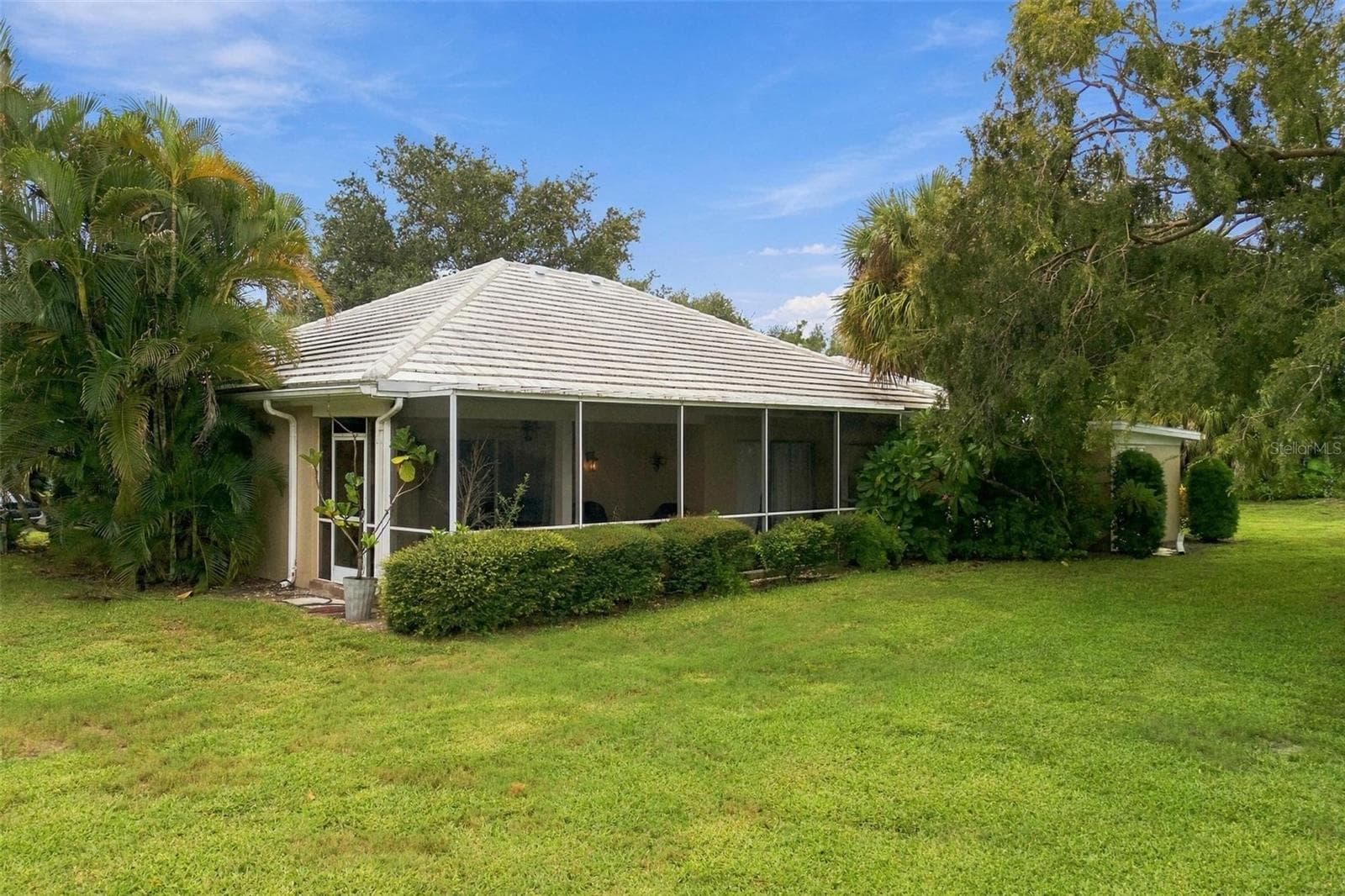 Rear view of the house from the yard. - 4 ANTIGUA CIR #6, ENGLEWOOD