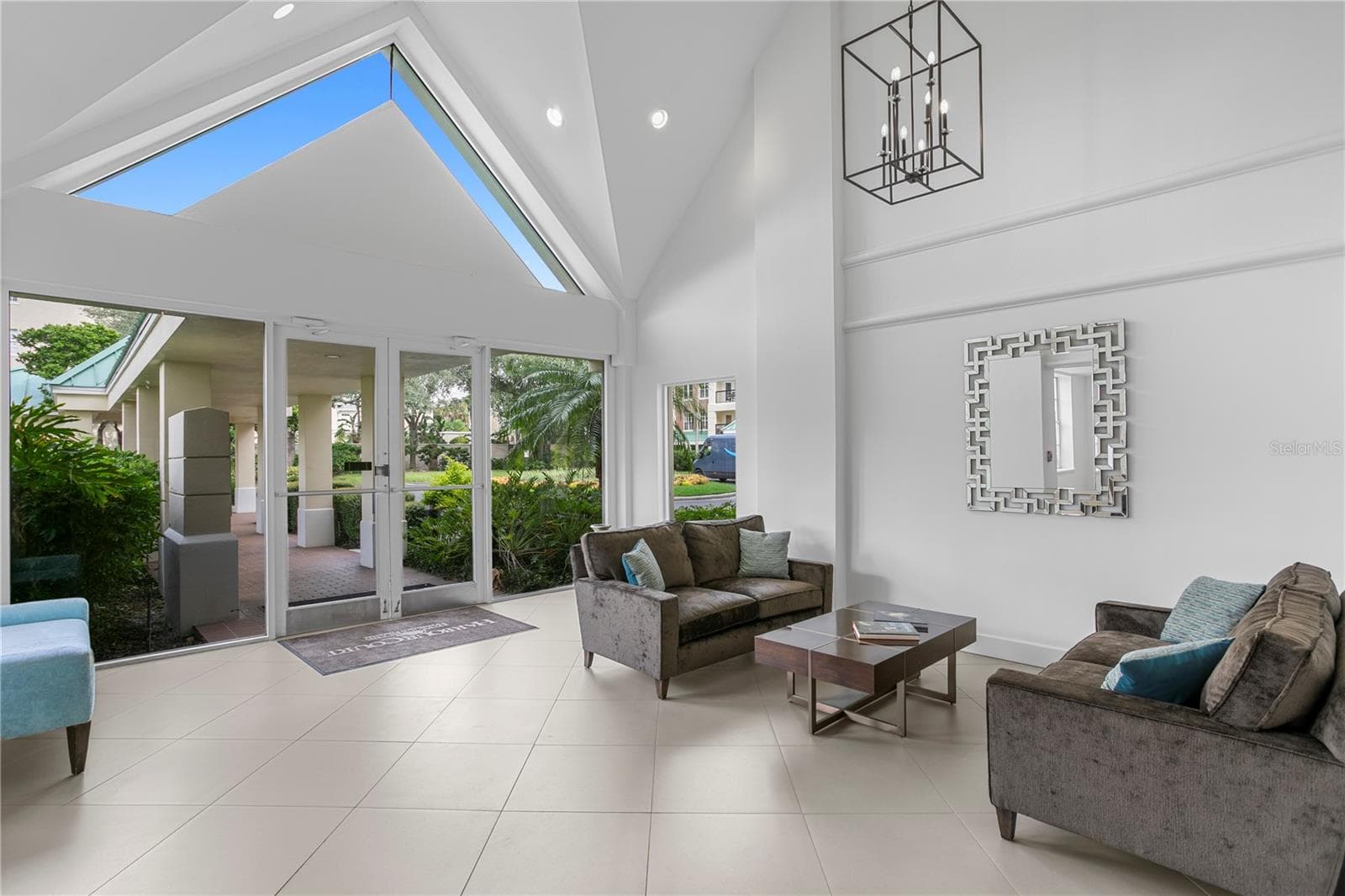 The condominium lobby welcomes you with abundant natural light and comfortable seating areas. - 1000 S HARBOUR ISLAND BLVD #2306, TAMPA