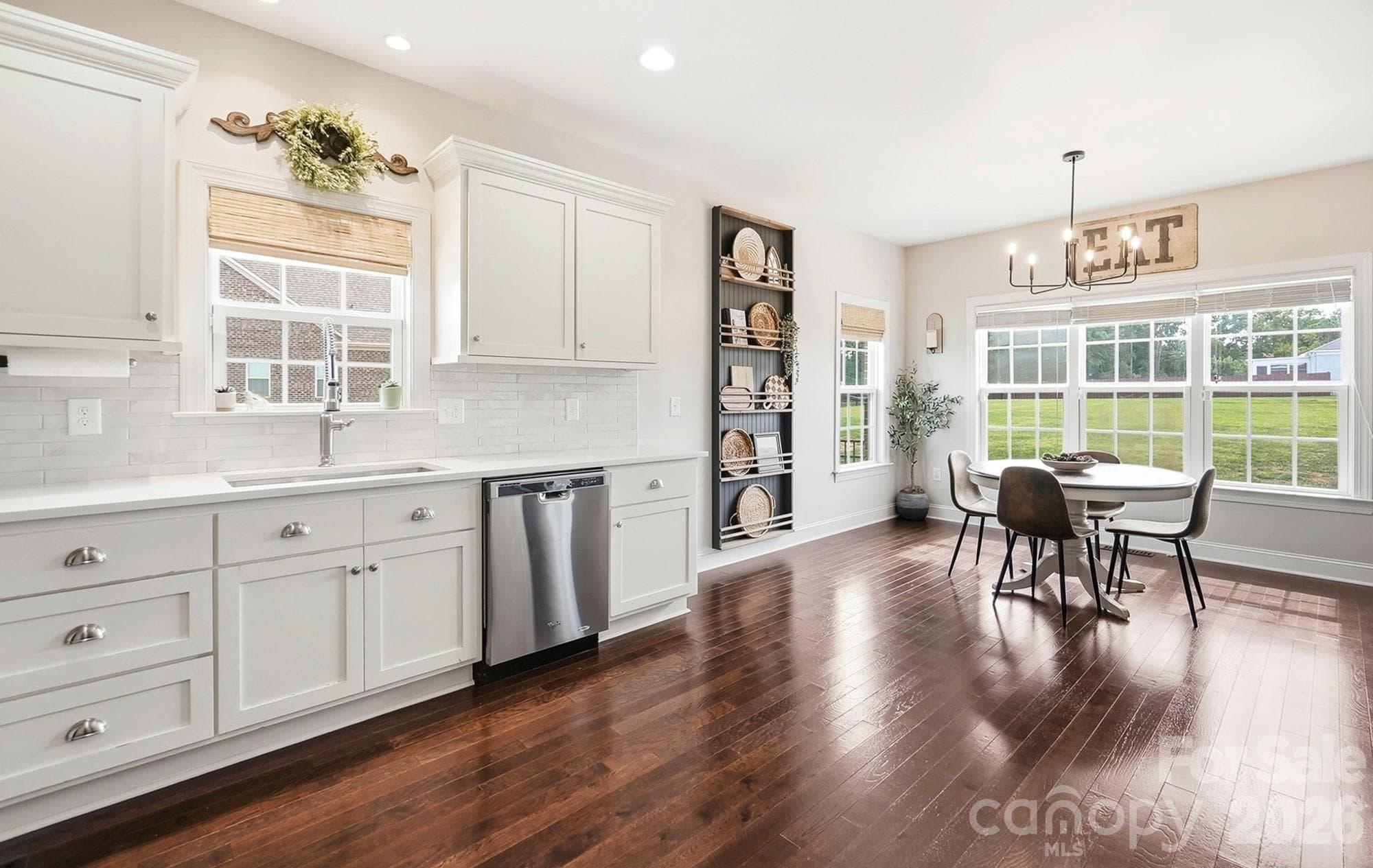 Chef's Kitchen Open to Dining Area - 4004 Camden Oaks Lane, Monroe