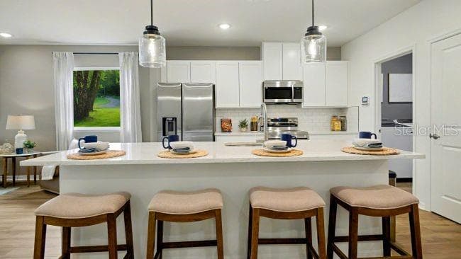 Model home - actual features may vary. - 31403 MALBEC DR, BROOKSVILLE