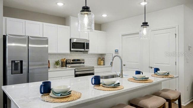 Model home - actual features may vary. - 31403 MALBEC DR, BROOKSVILLE