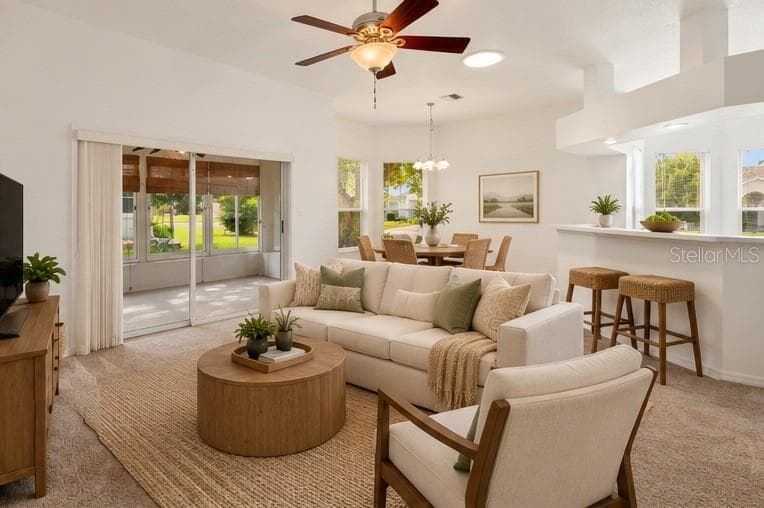 staged living room - 5761 MACAW PL, LAKELAND