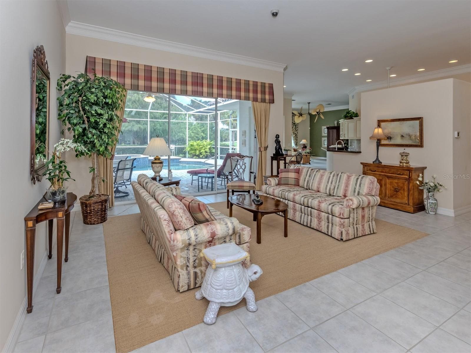 Pocketing doors for seamless indoor-outdoor connection. - 2009 TOCOBAGA LN, NOKOMIS
