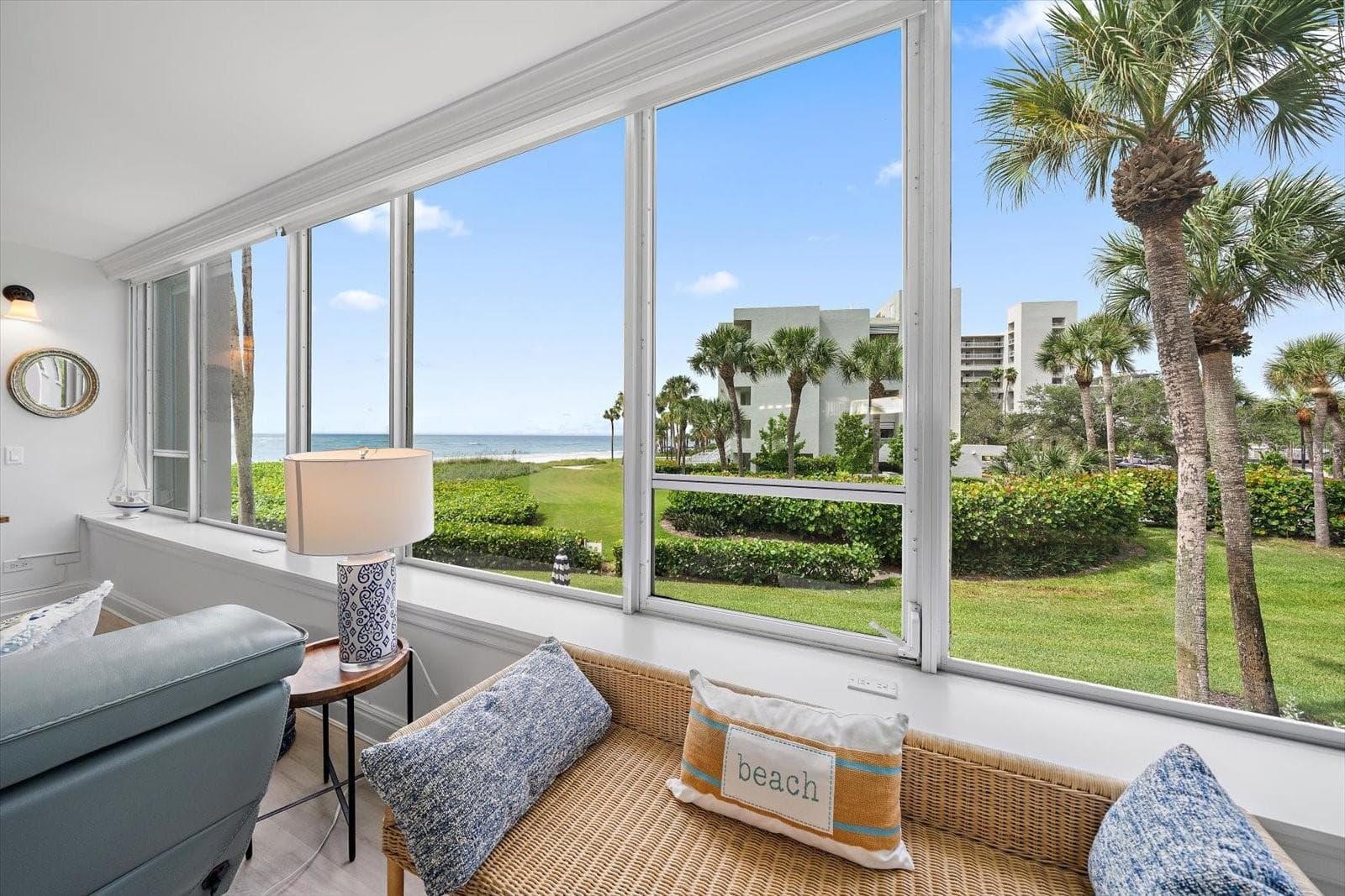 Bank of windows in Great room - 100 SANDS POINT RD #219, LONGBOAT KEY