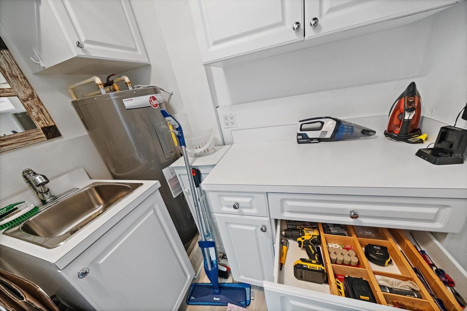 sink and extra storage in laundry - 100 SANDS POINT RD #219, LONGBOAT KEY
