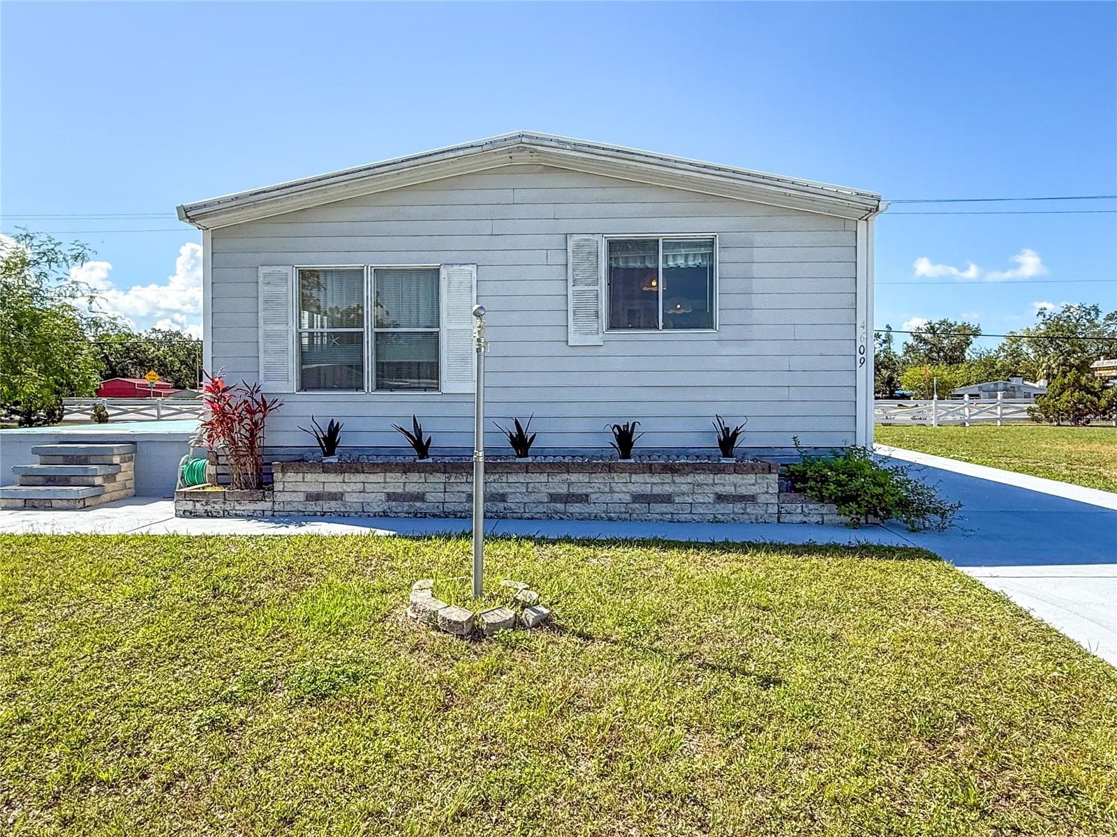 Manufactured Home at 4609 10TH STREET CT E, ELLENTON, photo 3 of 33