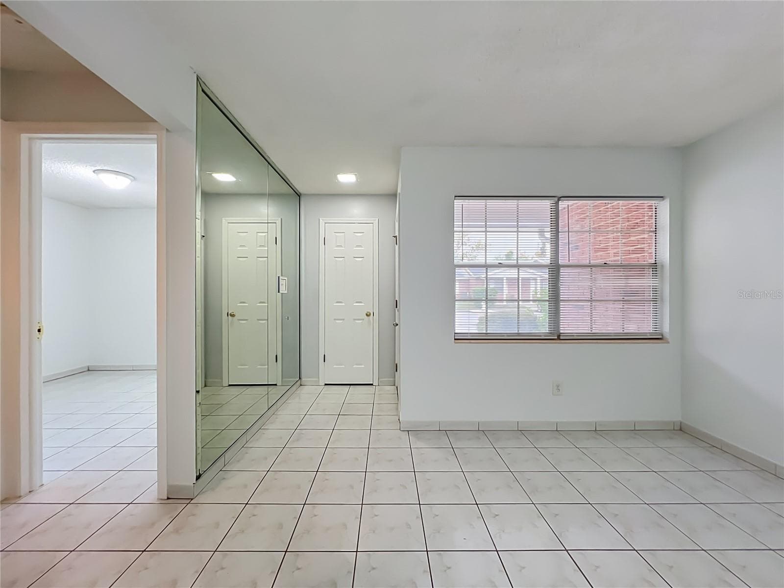 Open layout with plenty of natural light and a comfortable flow throughout the home. - 1225 CARRIAGE LN #1, ORLANDO
