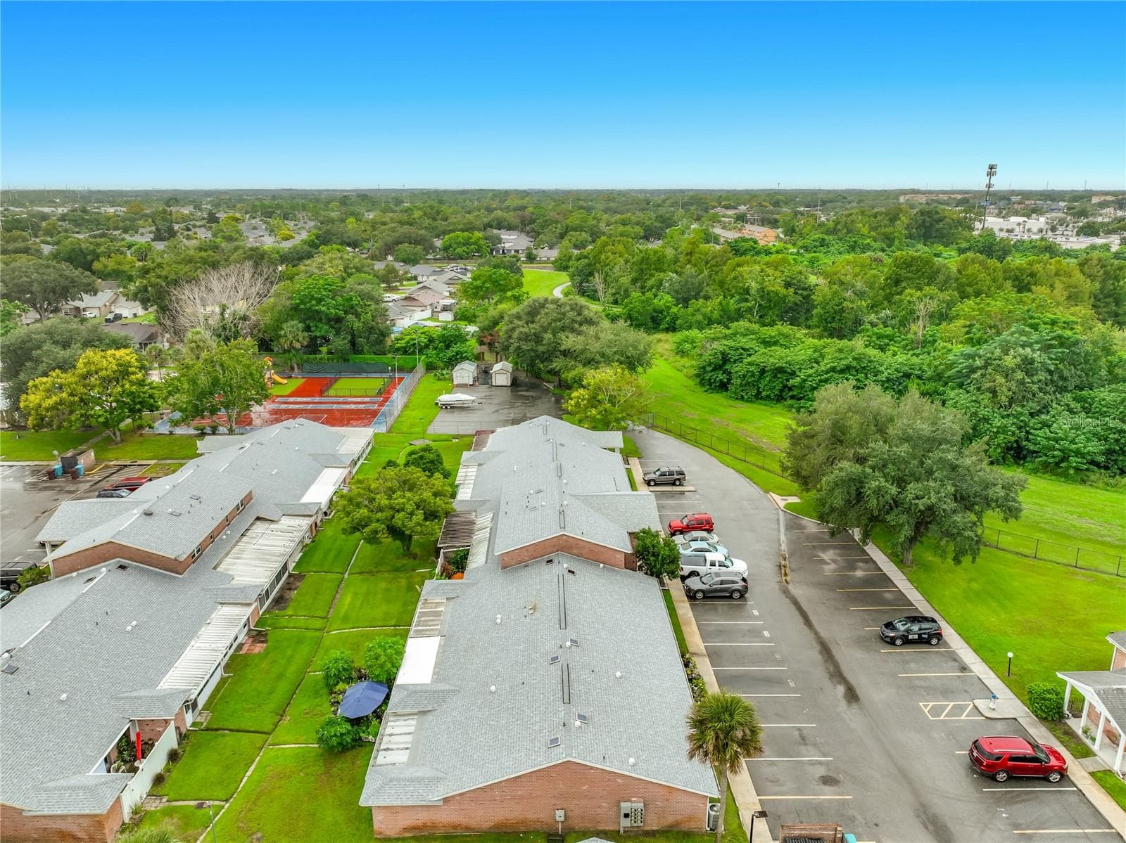 Aerial view showcasing the Candlewyck East community and surrounding area. - 1225 CARRIAGE LN #1, ORLANDO