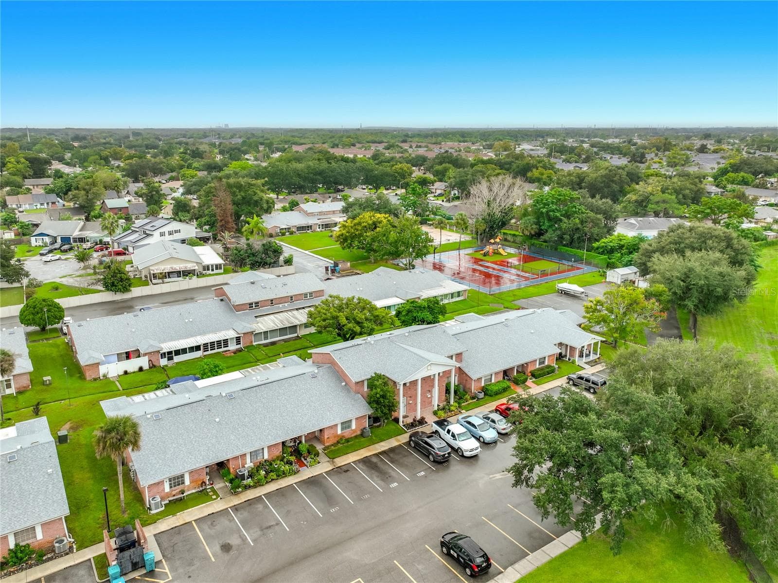 Aerial view of Candlewyck East and the surrounding Orlando area. - 1225 CARRIAGE LN #1, ORLANDO