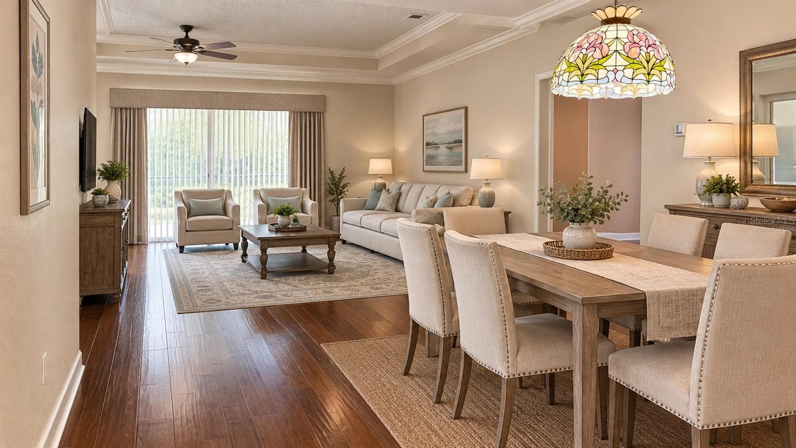 VIRTUALLY STAGED DINING ROOM & LIVING    ROOM WITH FURNITURE - 4056 SERENA LN, CLERMONT