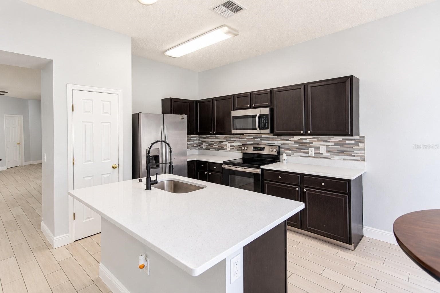 Single Family Residence at 1523 BLUE HORIZON DR, CLERMONT, photo 10 of 32