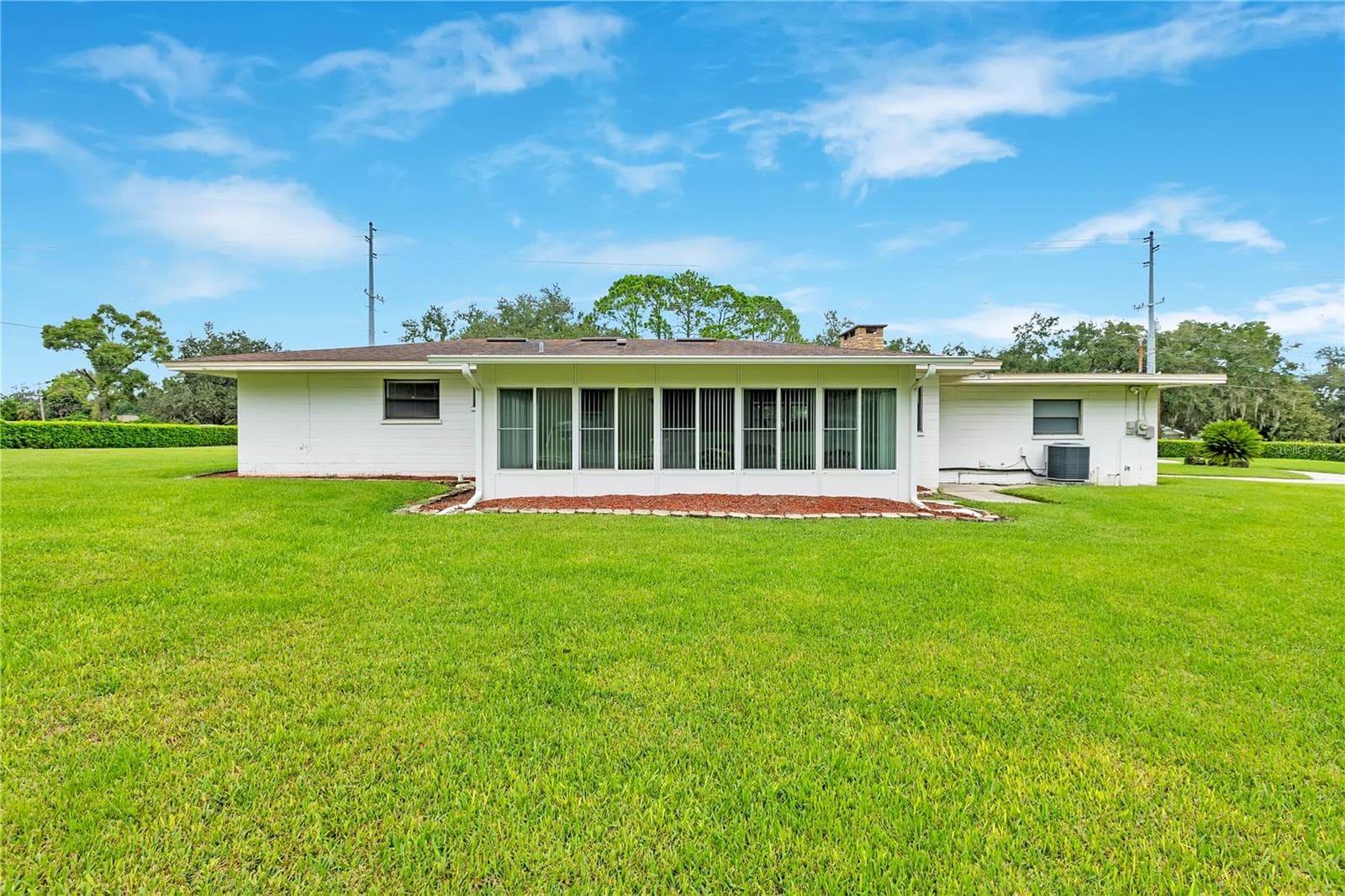 Rear Exterior off Florida Room - 1615 LAKE MIRIAM DR, LAKELAND