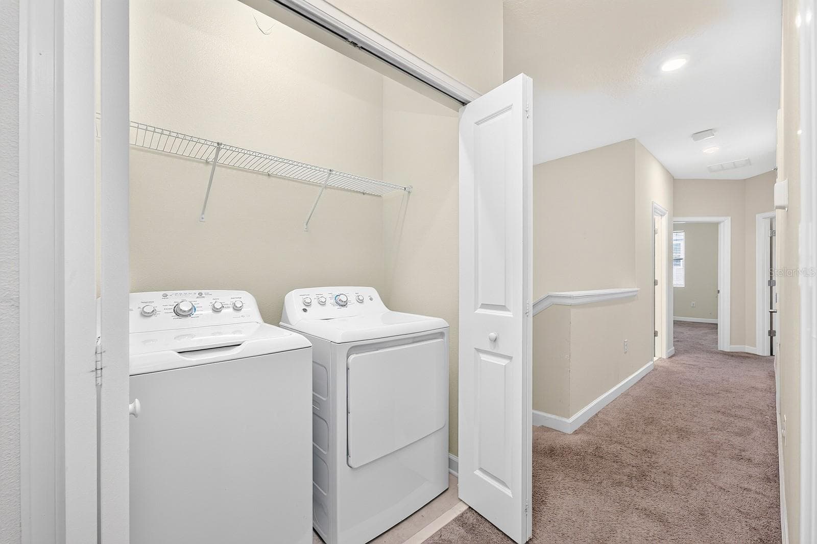 laundry closet is upstairs - 4911 TRIBUTE TRL, KISSIMMEE
