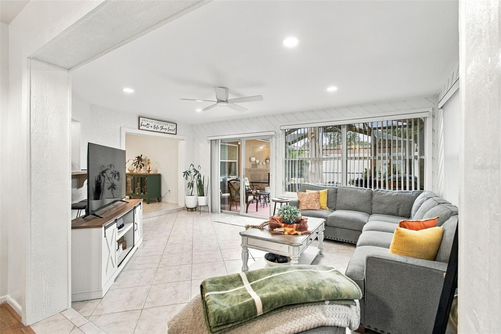 OPEN CONCEPT LEADS TO SCREENED POOL LANAI - 14304 91ST AVE, SEMINOLE