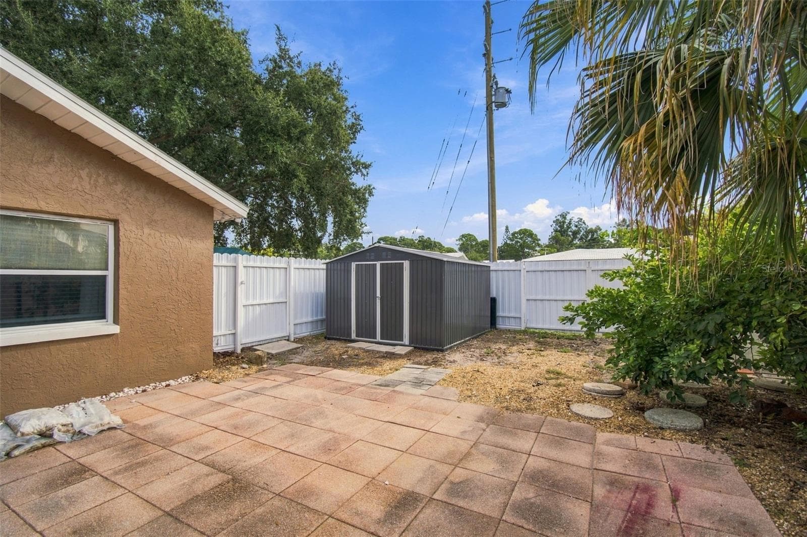 GATE ENTRANCE ON BOTH SIDES OF PROPERTY FOR EASY ACCESS - 14304 91ST AVE, SEMINOLE