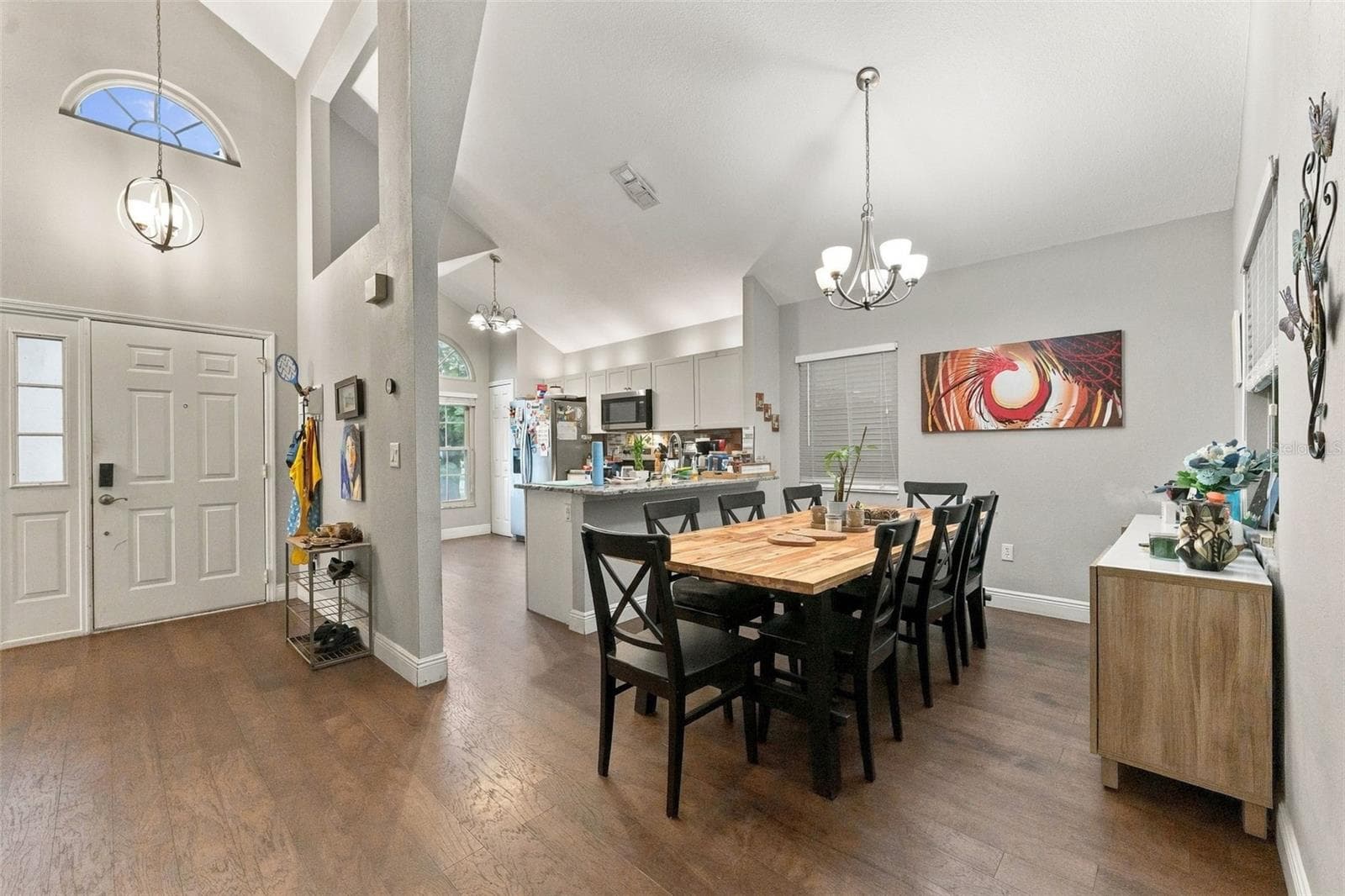 Open kitchen and dining area - 1621 SPINNING WHEEL DR, LUTZ