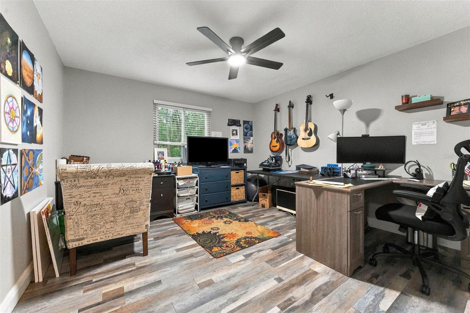 Bedroom 4 upstairs, being used as an office - 1621 SPINNING WHEEL DR, LUTZ