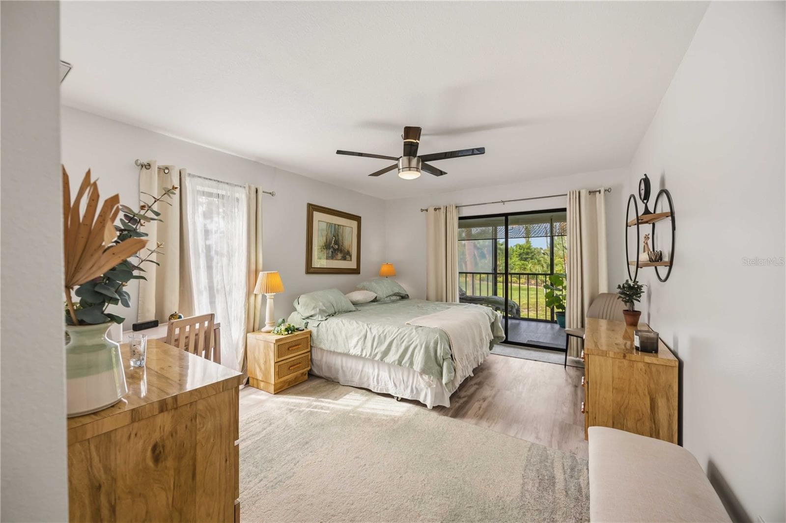 large primary bedroom with access to the balcony - 4260 PLACIDA RD #17A, ENGLEWOOD