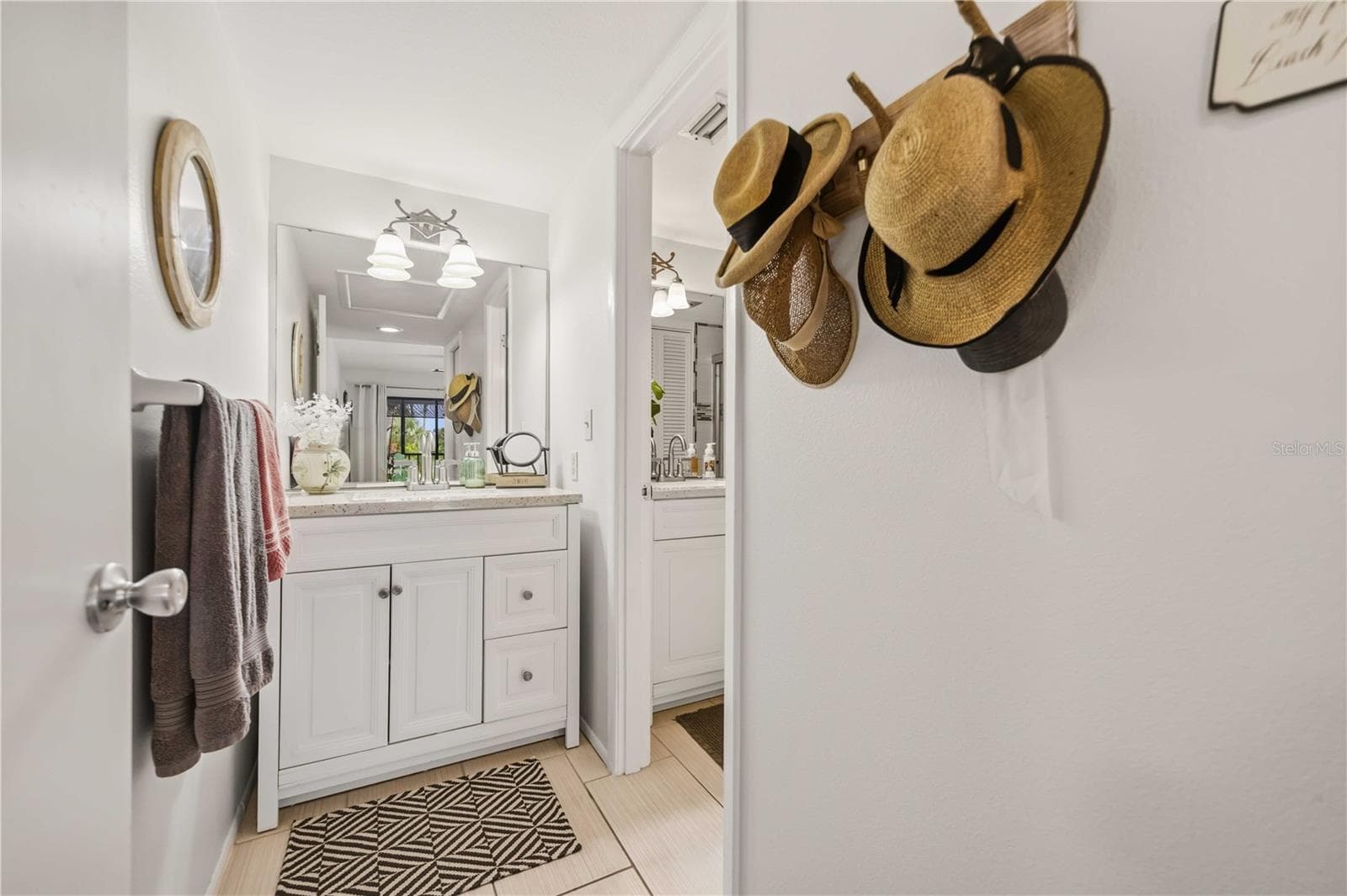 primary bathroom vanity with 2 sinks - 4260 PLACIDA RD #17A, ENGLEWOOD