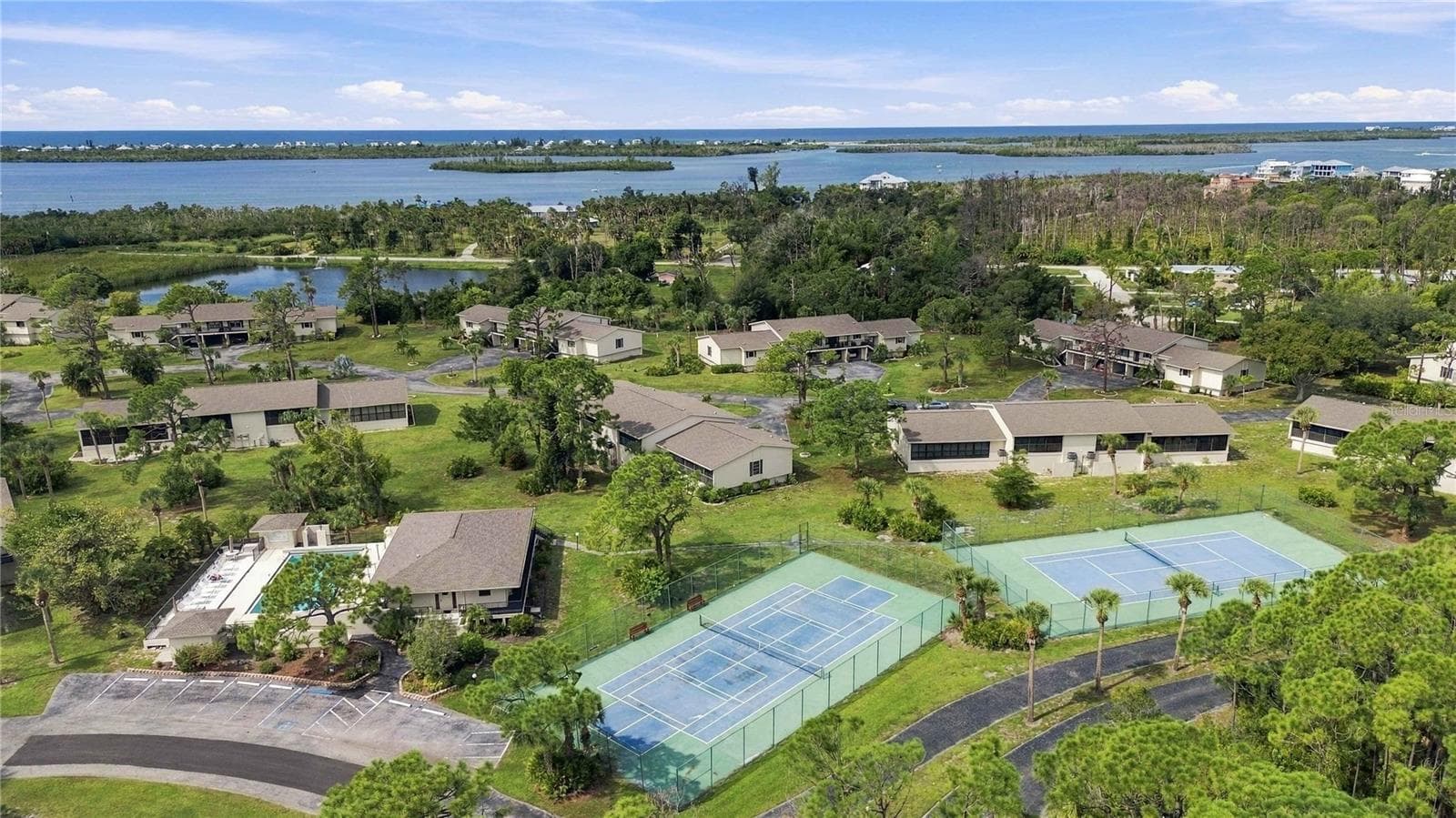 lots of amenities - pickle ball, tennis, pool, clubhouse - 4260 PLACIDA RD #17A, ENGLEWOOD