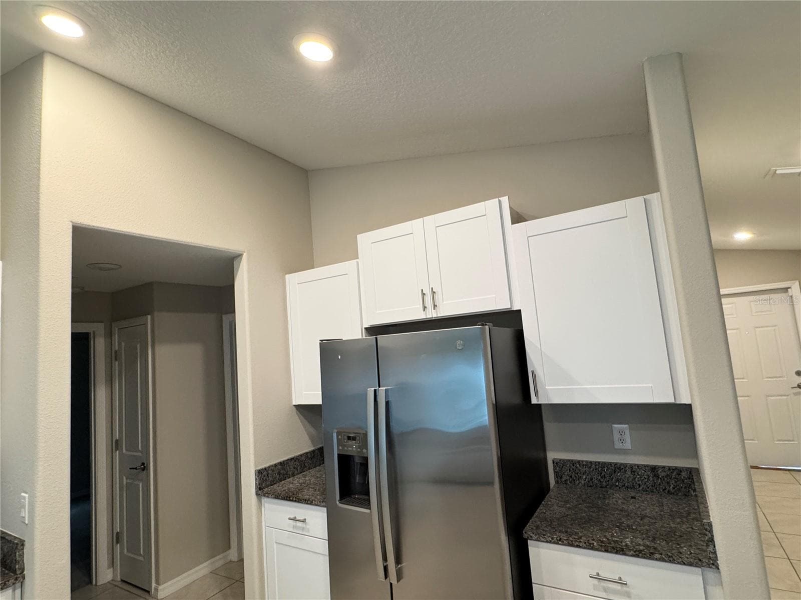 Kitchen with Refrigerator and planty of cabinets - 1755 YELLOW TRL, LAKELAND