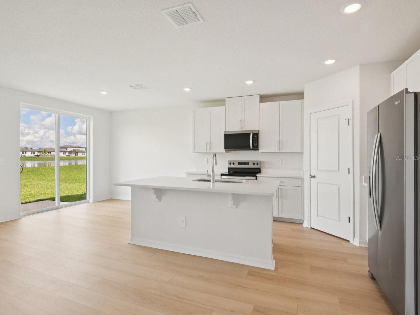 Photos are not of the actual home, but are photos of the builder home with same floorplan - 3906 NATURE SOUND LN, BARTOW