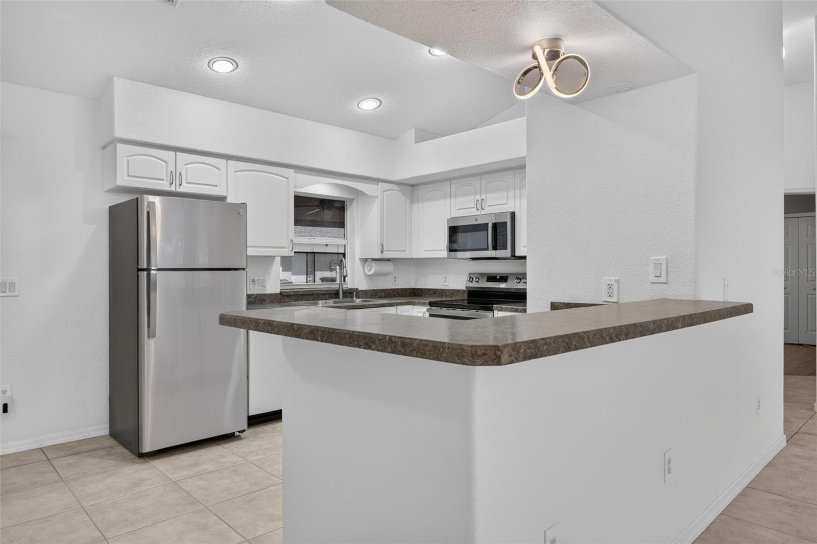 Kitchen Breakfast Bar Area - 2184 ONONDAGA LN, PUNTA GORDA
