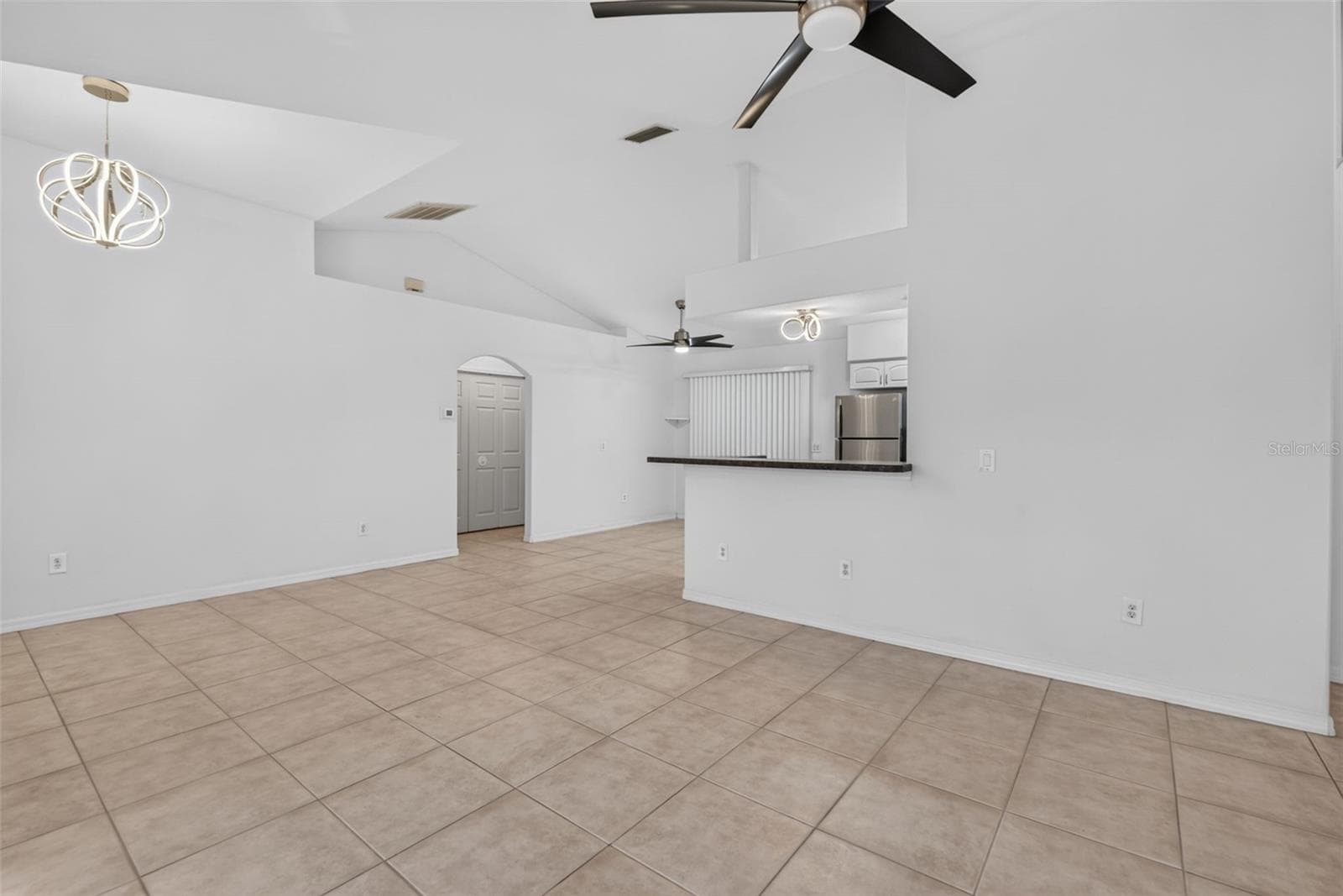 L-Shaped Living to Dining Area, Breakfast Bar - 2184 ONONDAGA LN, PUNTA GORDA