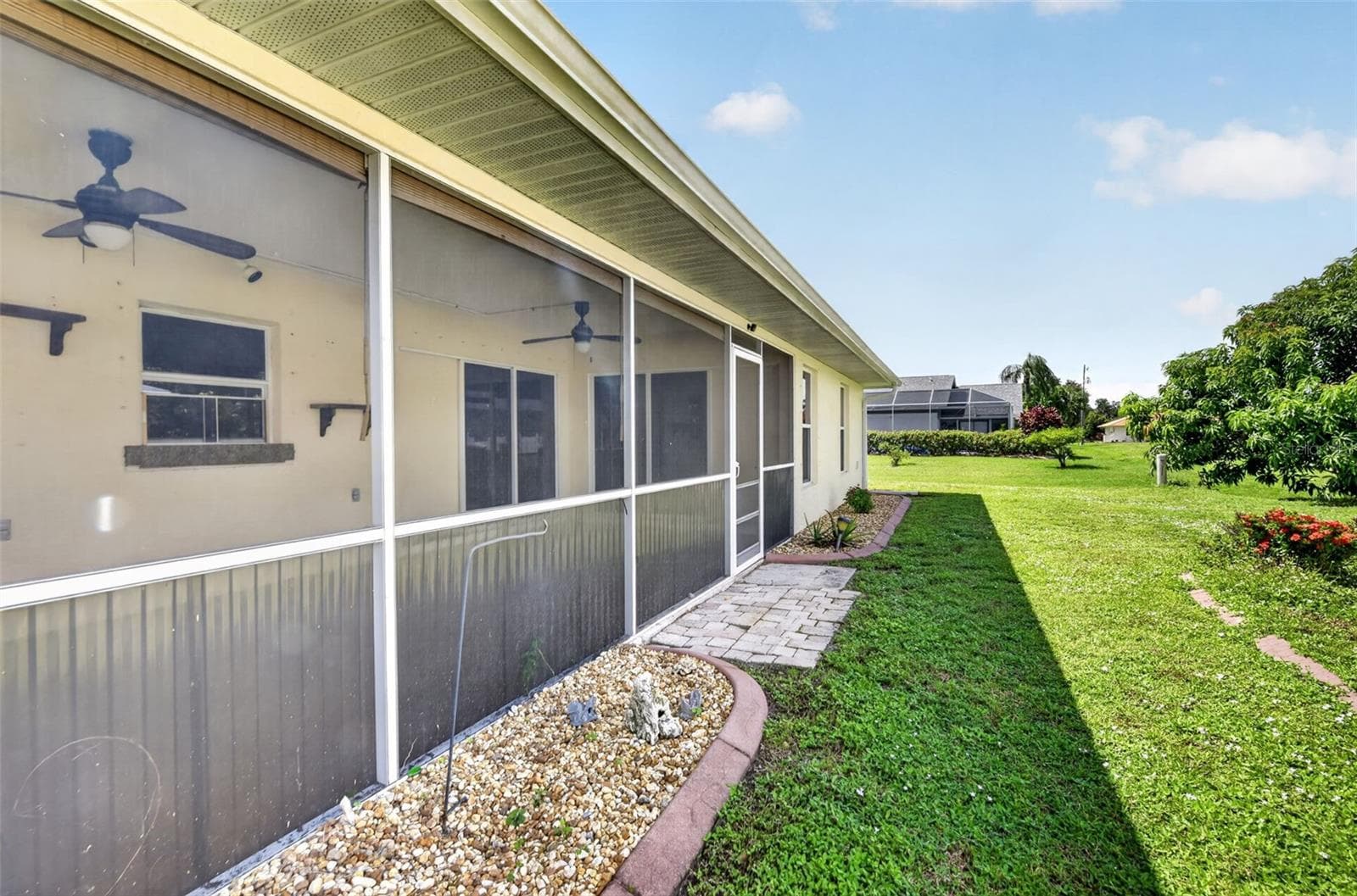 Rear Yard View - East Elevation - 2184 ONONDAGA LN, PUNTA GORDA