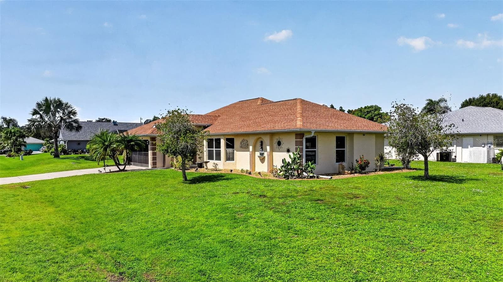 Front and Eastside View - Southeast Elevation - 2184 ONONDAGA LN, PUNTA GORDA