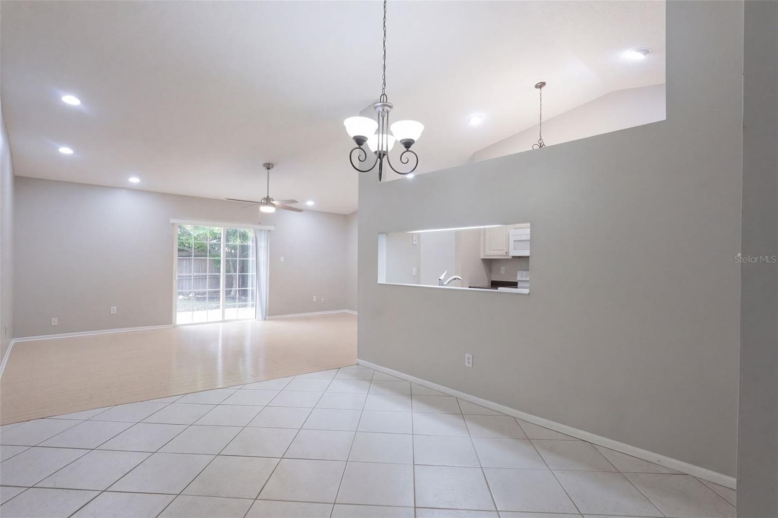 Dining Area Showing Great Room behind - 102 OAKRIDGE CT, SANFORD