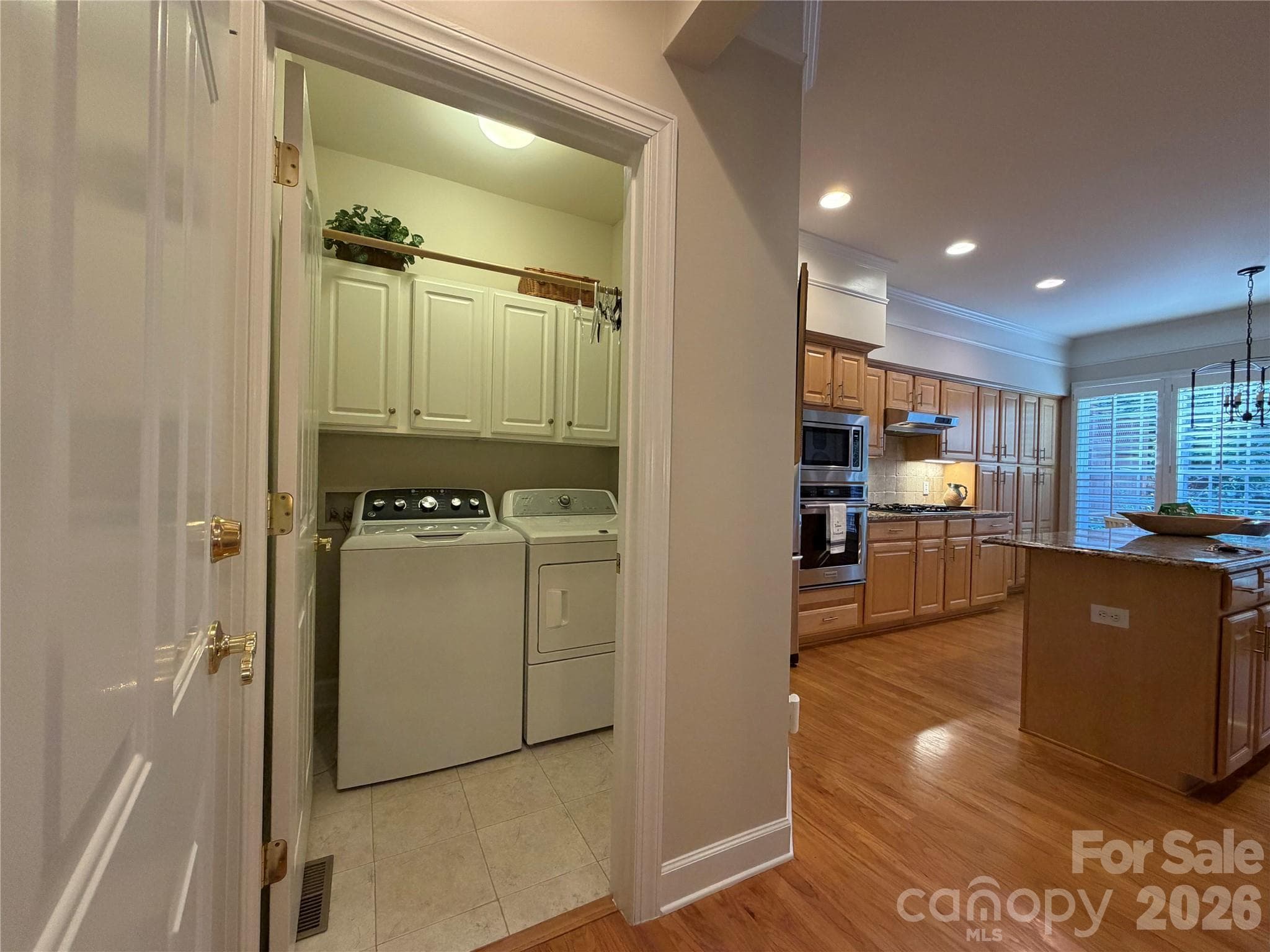Laundry room off kitchen - 11437 Corliss Avenue, Charlotte