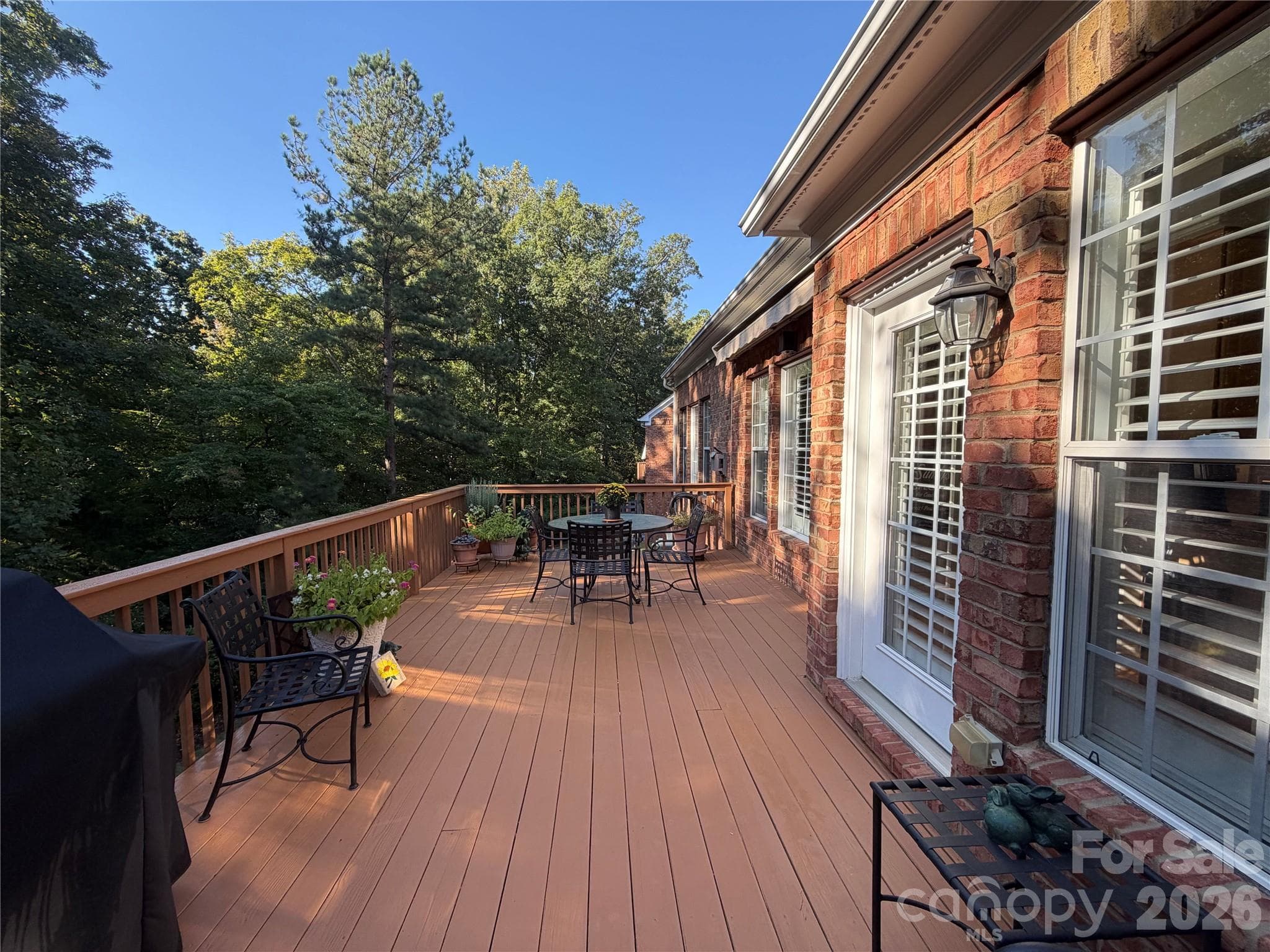 Private 20-foot deck with gas line for grill and retractable awning. - 11437 Corliss Avenue, Charlotte