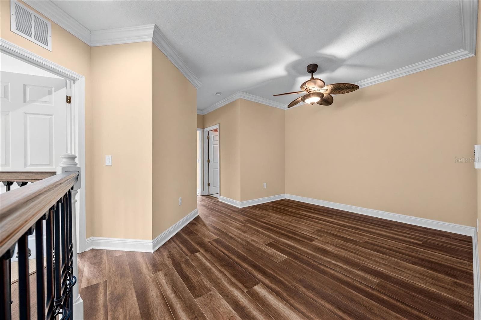 A flexible upstairs space with room for a desk, reading nook, or cozy sitting area. - 8432 MIRAMAR WAY, LAKEWOOD RANCH