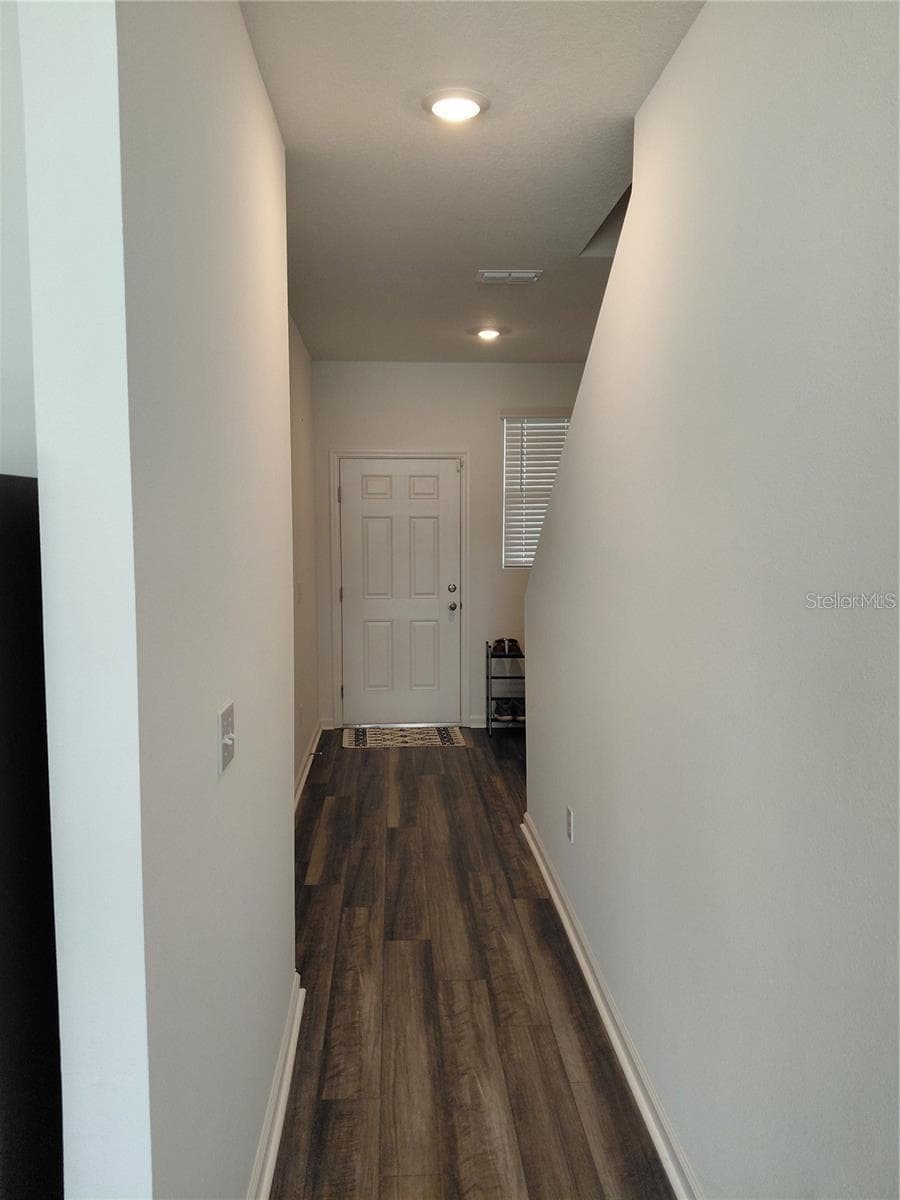 Hallway view to front door - 14947 PISA PKWY, DADE CITY