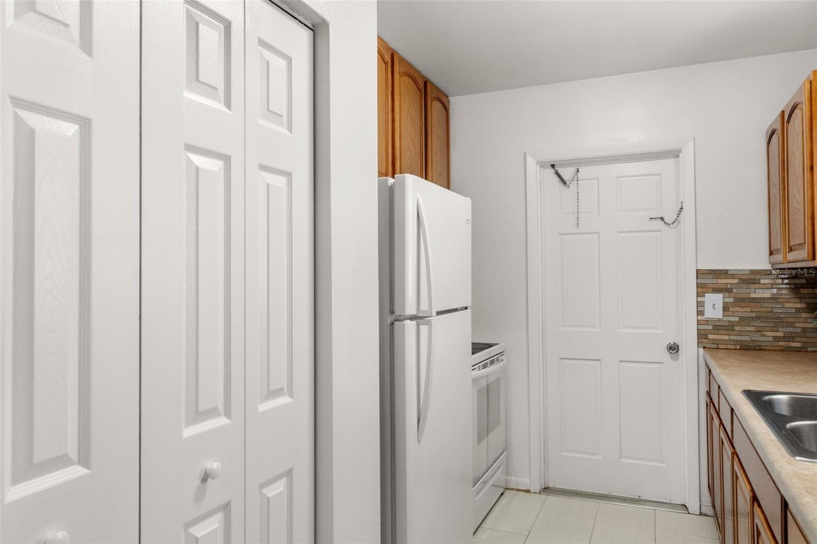 Storage Closet in Kitchen - 7121 CATALINA ST, SPRING HILL