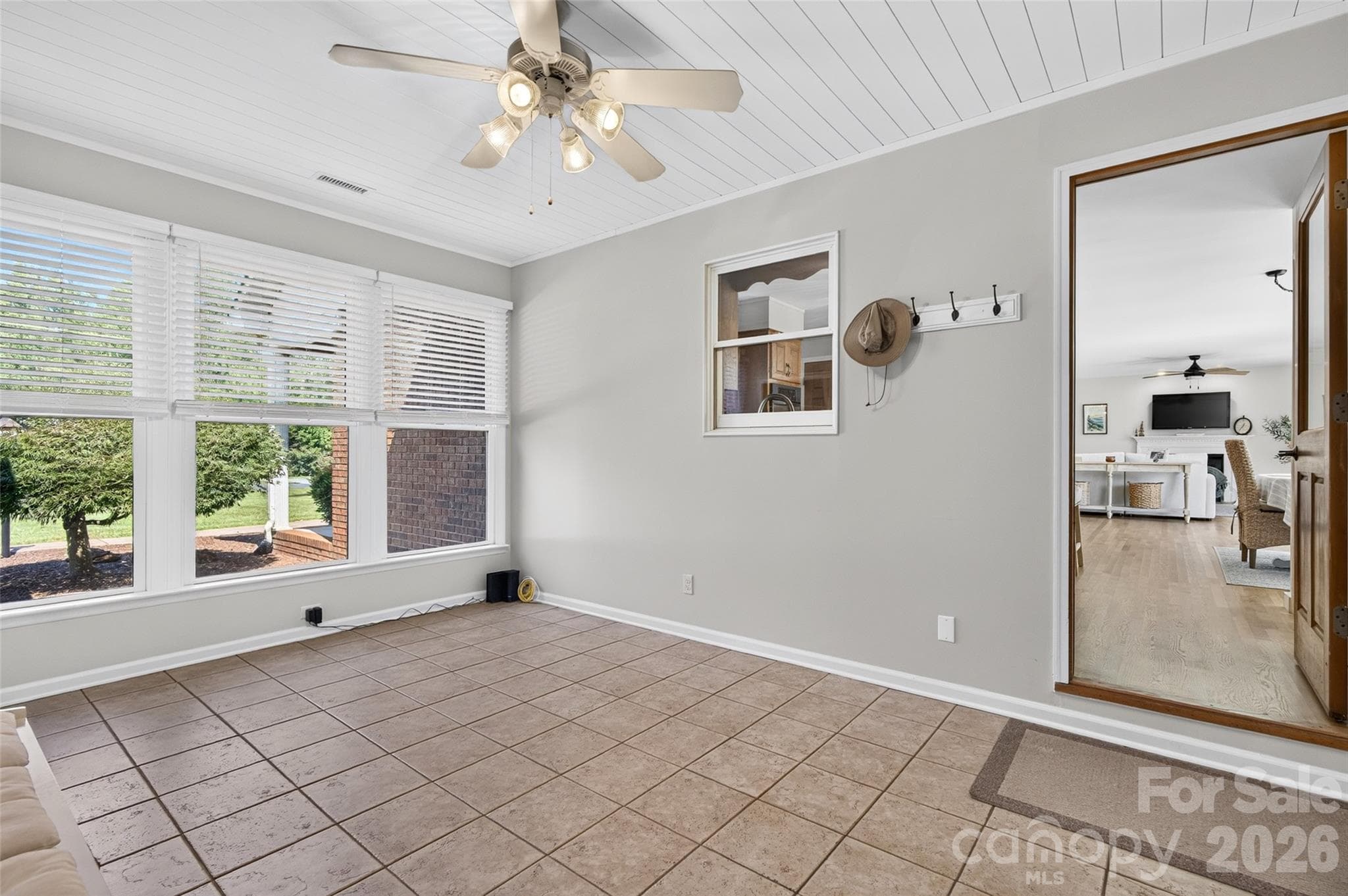Sunroom just off the kitchen - 171 Pleasant Drive, Statesville