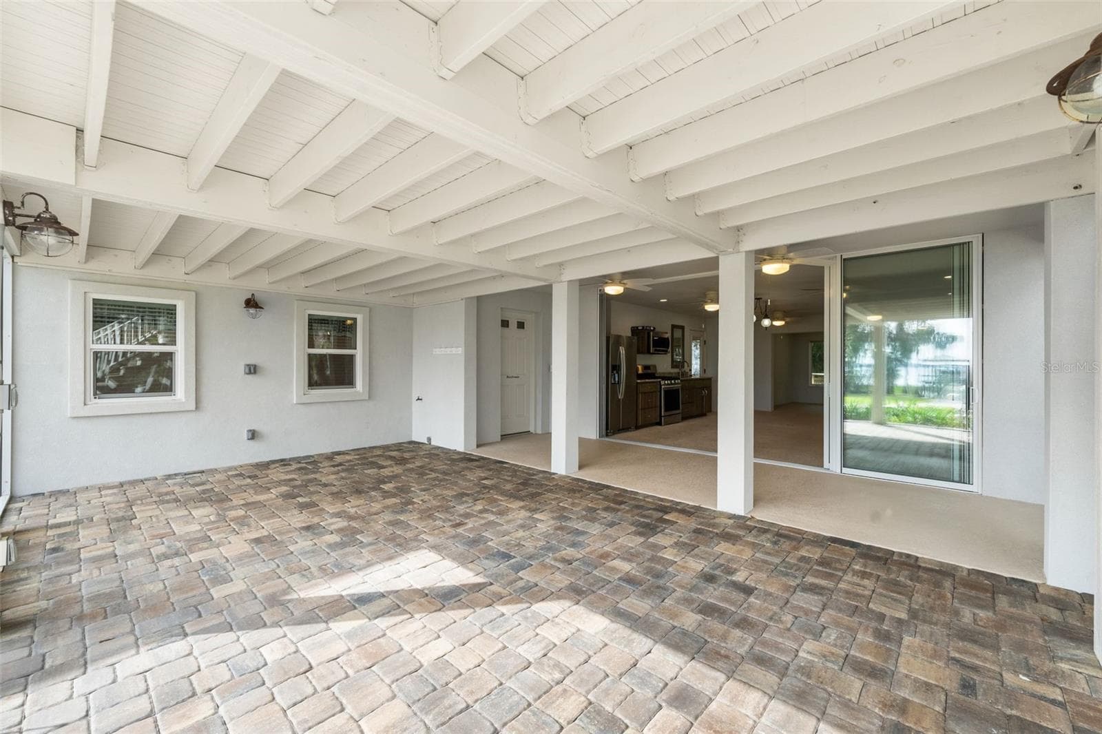 Patio lake view 2nd floor - 8026 NE 221ST ST, MELROSE