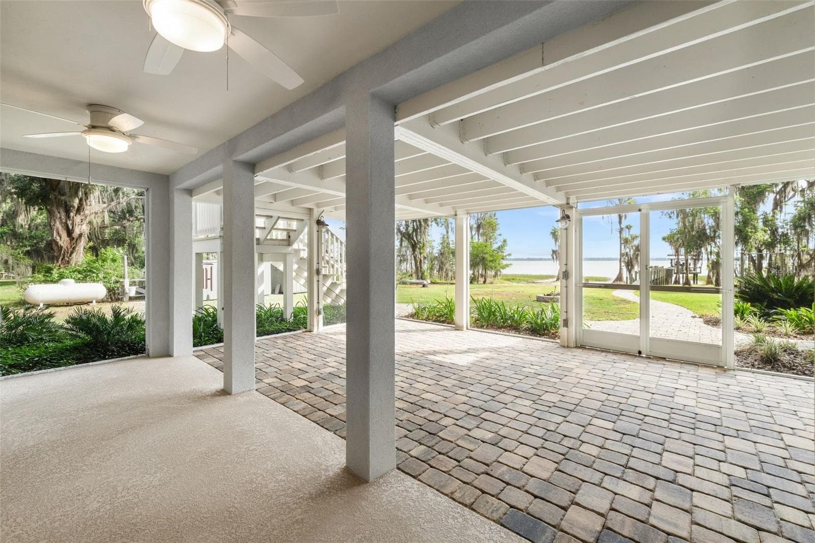Patio lake view - 8026 NE 221ST ST, MELROSE
