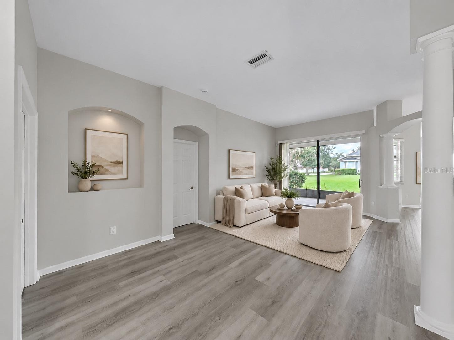 visual staging: living room - 9310 MANGROVE CT, TAMPA