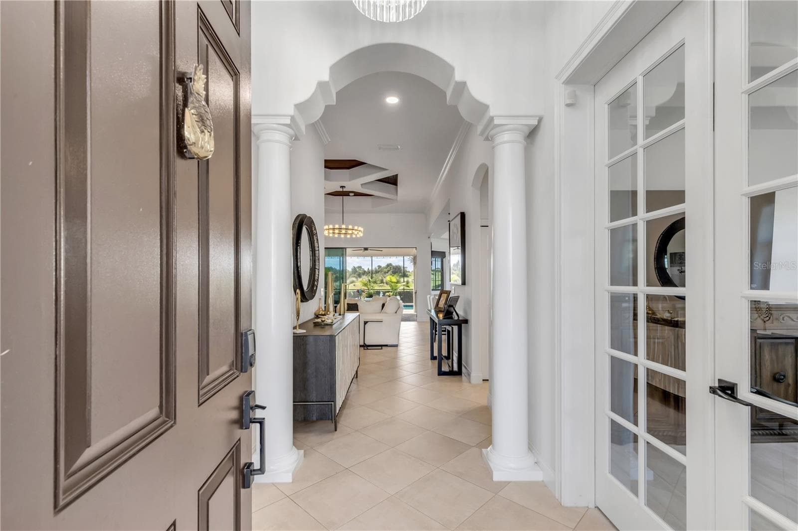 View from the front to elevated outdoor living. - 189 ASPEN WAY, PALM COAST