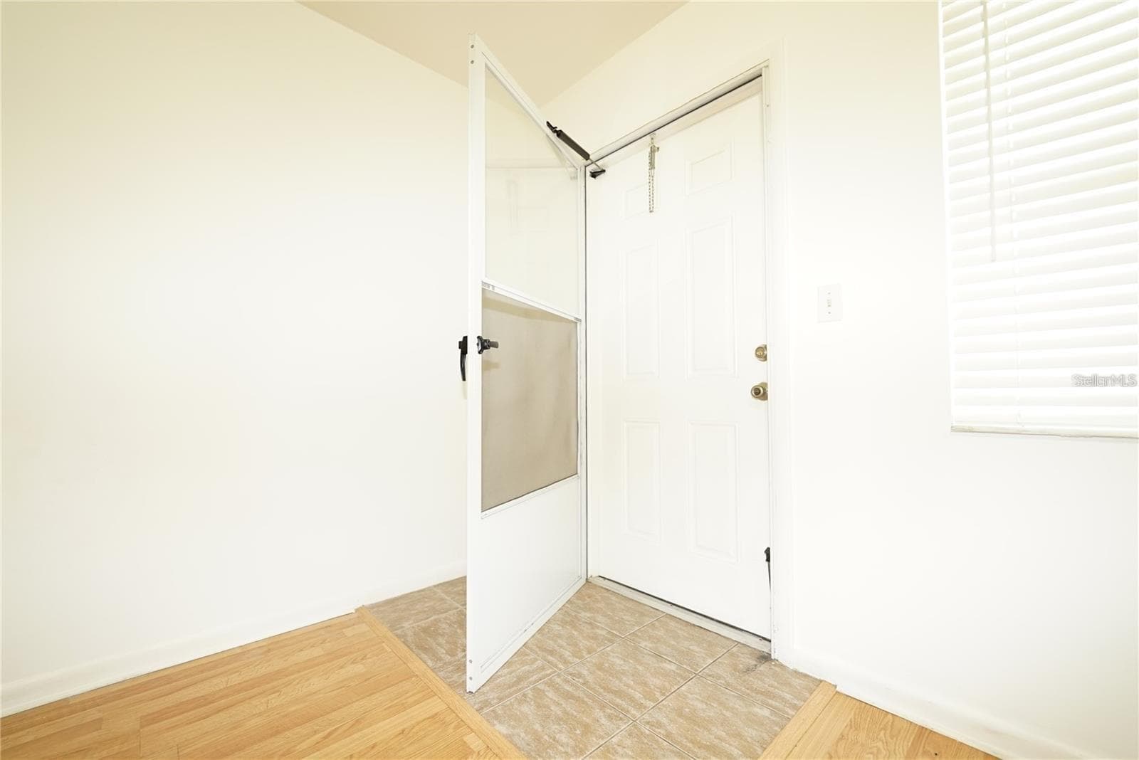 Exterior door visible. - 5810 21ST ST N #15, ST PETERSBURG