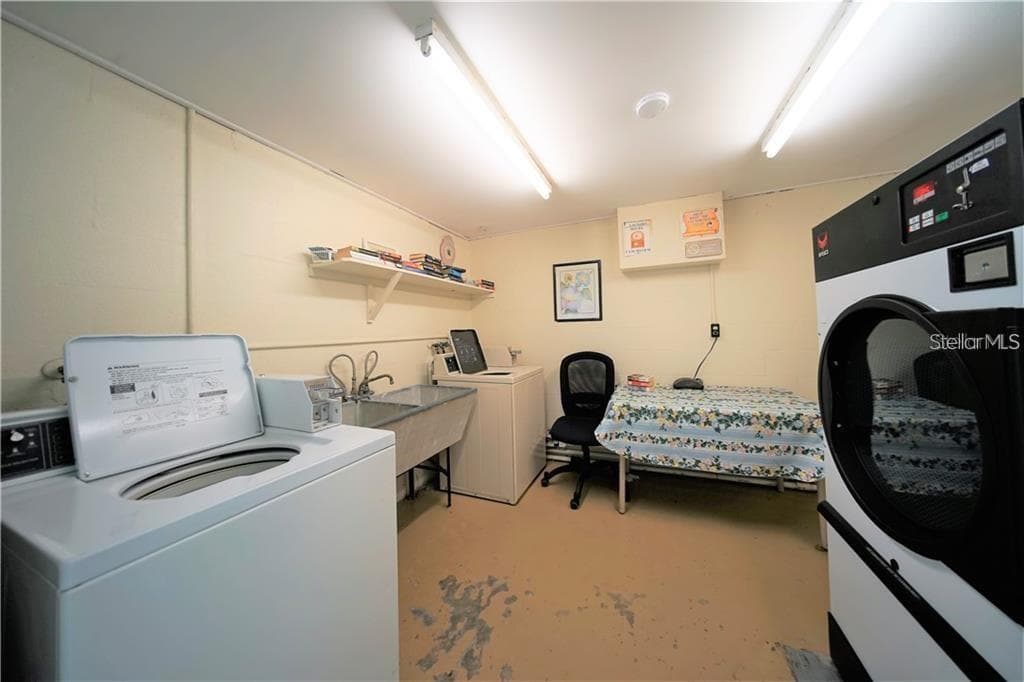 Common Laundry room on the ground floor - 5810 21ST ST N #15, ST PETERSBURG