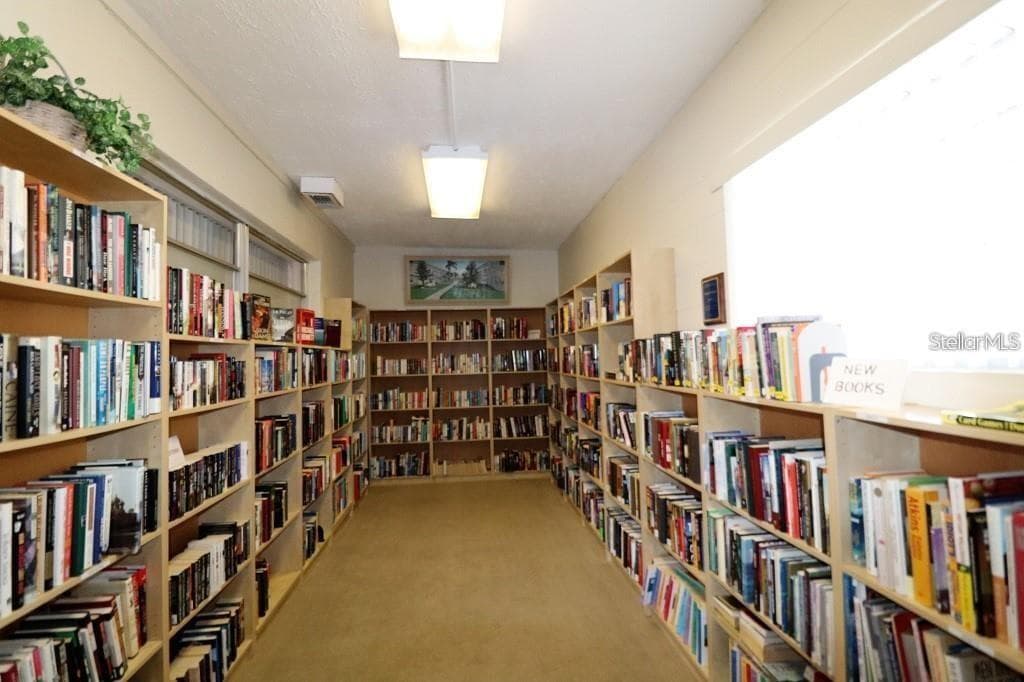 A library inside the clubhouse. - 5810 21ST ST N #15, ST PETERSBURG