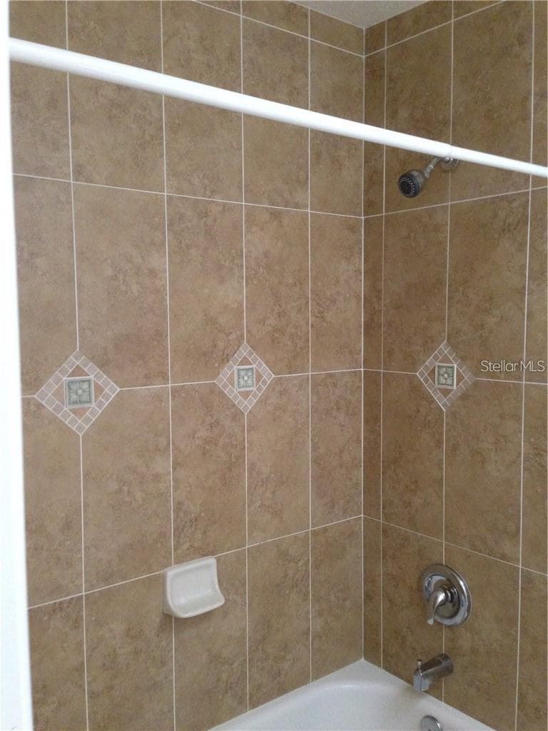 TILE WALLS IN GUEST BATH 2 - 23040 JUMPER AVE, PORT CHARLOTTE