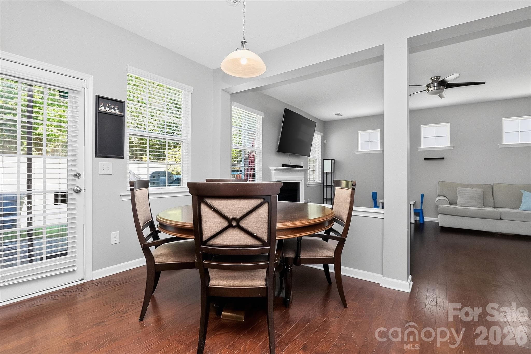 Eat in kitchen open to living room, door to backyard. - 78066 Rillstone Drive, Lancaster