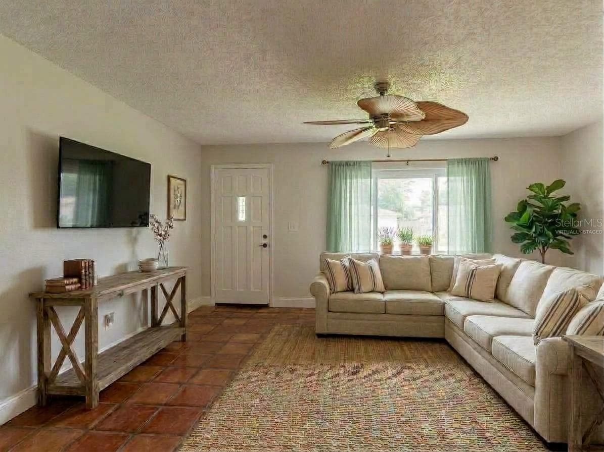 Virtually staged living room. - 112 10TH ST, ST CLOUD