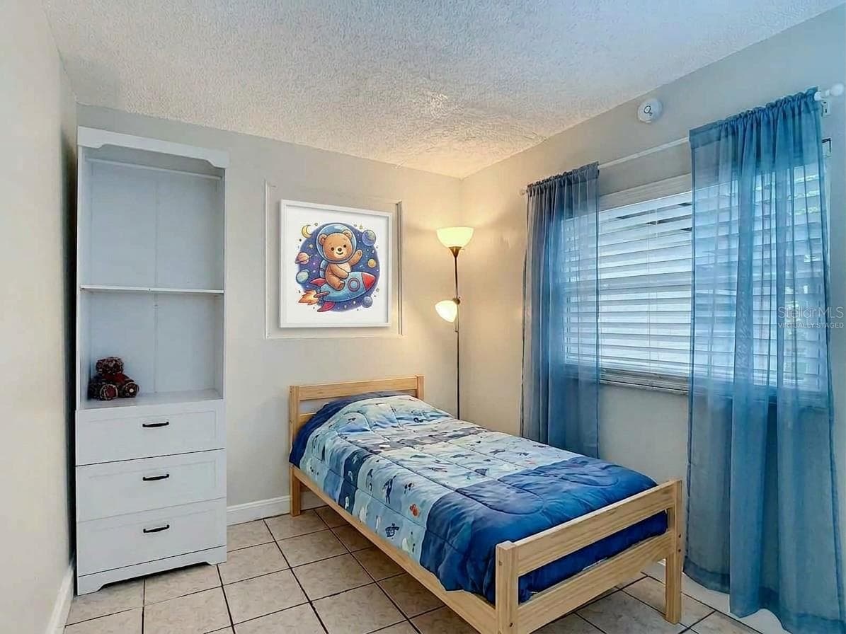 Virtually staged 3rd bedroom. - 112 10TH ST, ST CLOUD